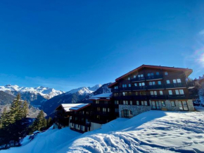 Appartement Le Charmantin Courchevel Village skis aux pieds